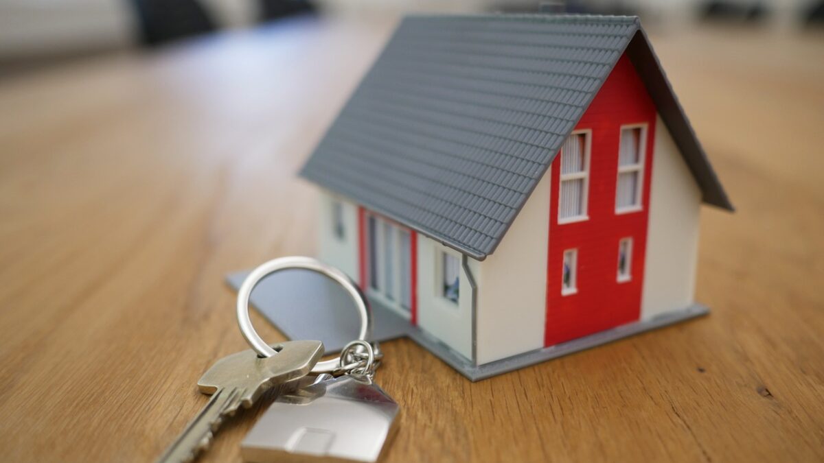 Small House with keys on a table