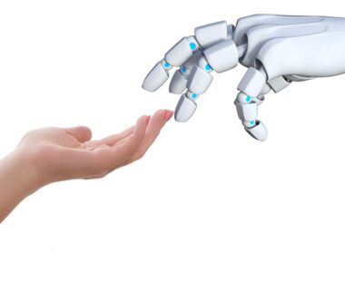 Human hand touching a robot hand