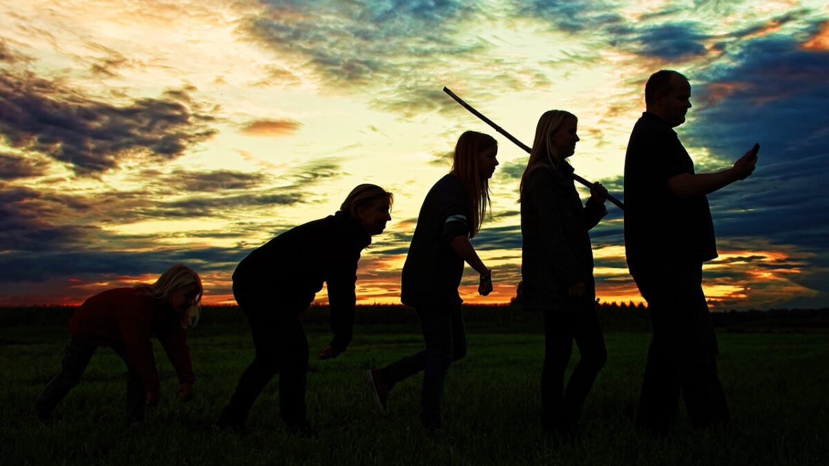 An image of a sky with the shadow of the evolution of humans