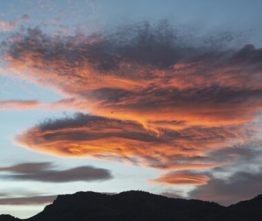 Sunset with clouds and mountains